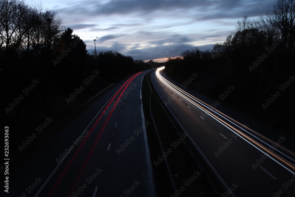 motorway freeway traffic head and tail light trails