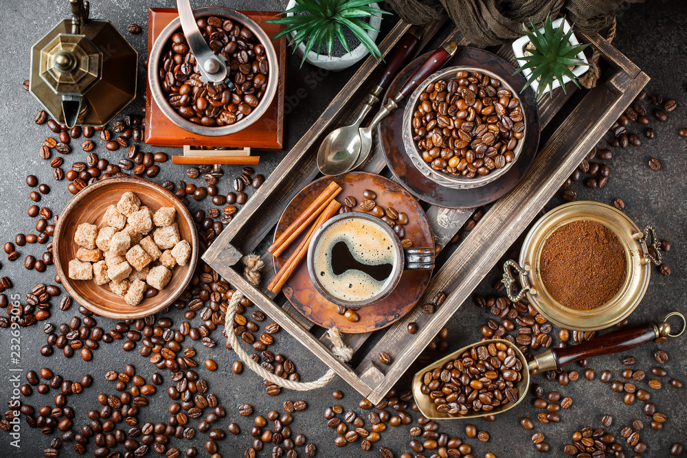 Black coffee in a cup on old background Black coffee in a cup on old background