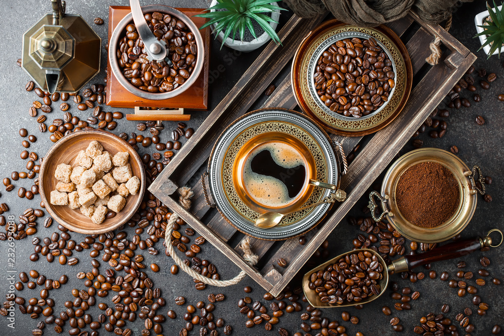 Black coffee in a cup on old background Black coffee in a cup on old background