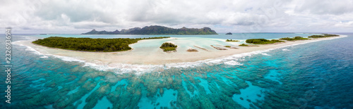 Aerial view of Raivavae island with beaches, coral reef and motu in azure turquoise blue lagoon. Tubuai Islands (Austral ), French Polynesia, Oceania photo