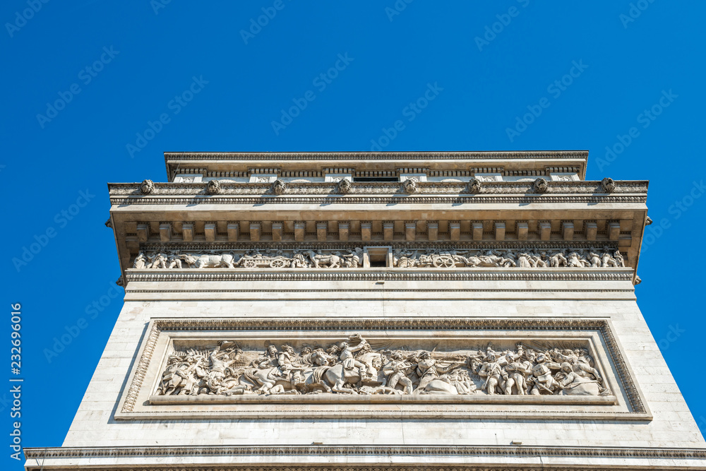 Fototapeta premium Arc de Triomphe on blue sky in Paris France