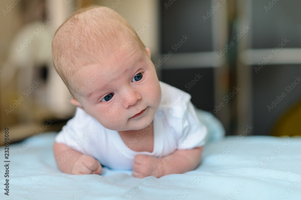 Happy Adorable baby boy learning to crawl Happy Adorable baby boy learning to crawl