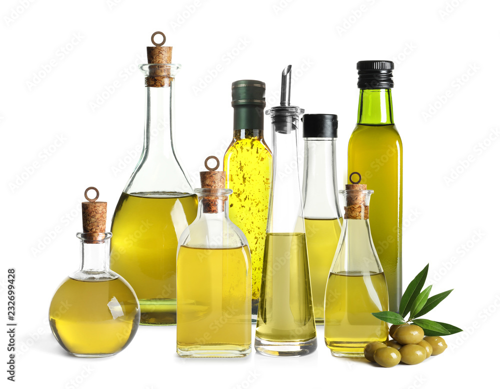 Set with olive oil bottles on white background