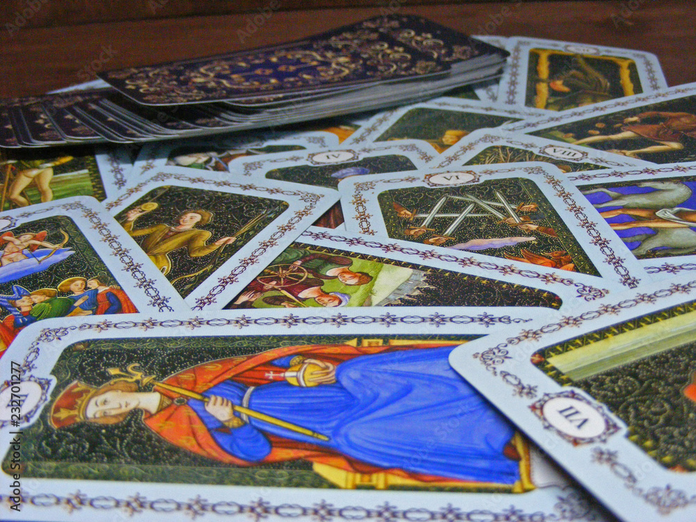 Naklejka premium Colorful tarot cards close up