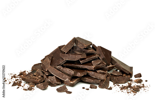 Pile of Broken chocolate pieces, morsels and cracked chocolate parts isolated on white background