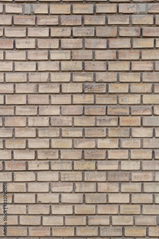 Background of old vintage light brown brick wall