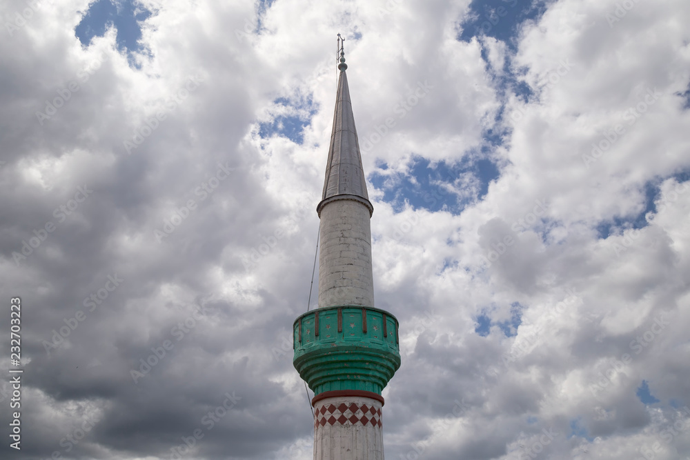 The minaret of mosque with Yavuz Sultan Selim bridge view for Islamic and blessed Friday concept.