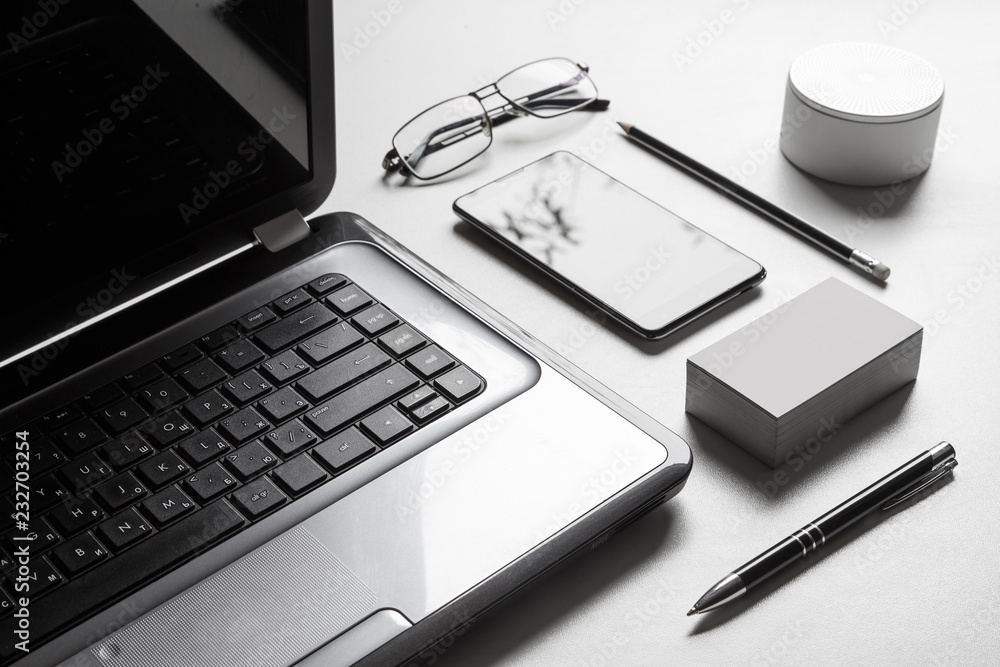 Stylish modern businessman workplace concept on white table Stylish modern businessman workplace concept on white table