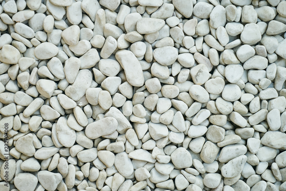 White pebbles stone texture background with copy space White pebbles stone texture background with copy space
