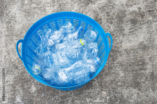 Plastic bottles in waste basket.