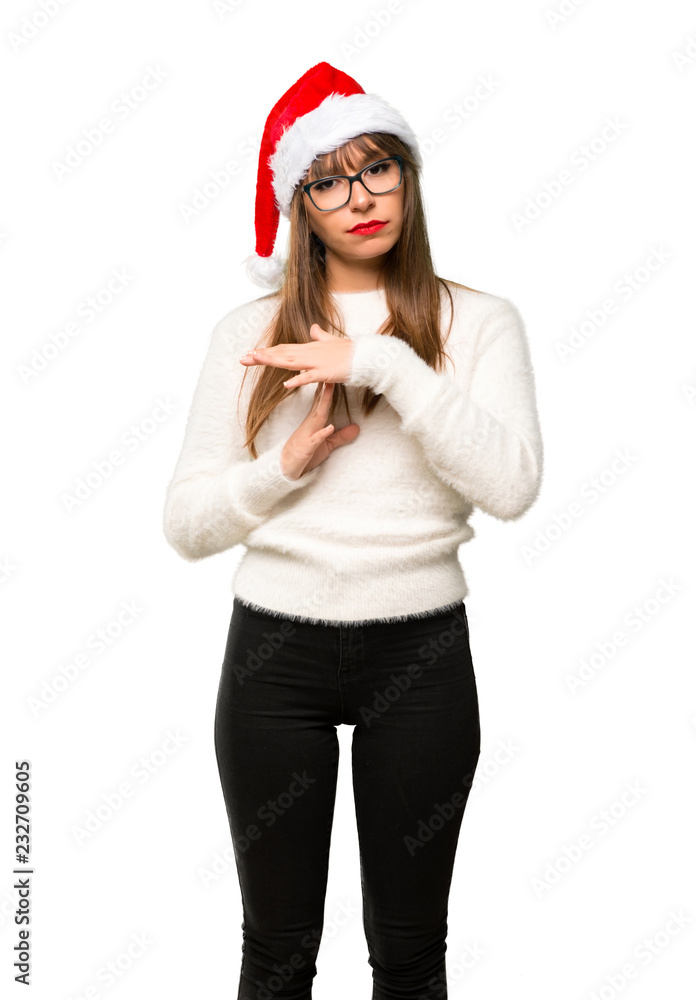Girl with celebrating the christmas holidays making stop gesture with her hand to stop an act on isolated white background Girl with celebrating the christmas holidays making stop gesture with her hand to stop an act on isolated white background