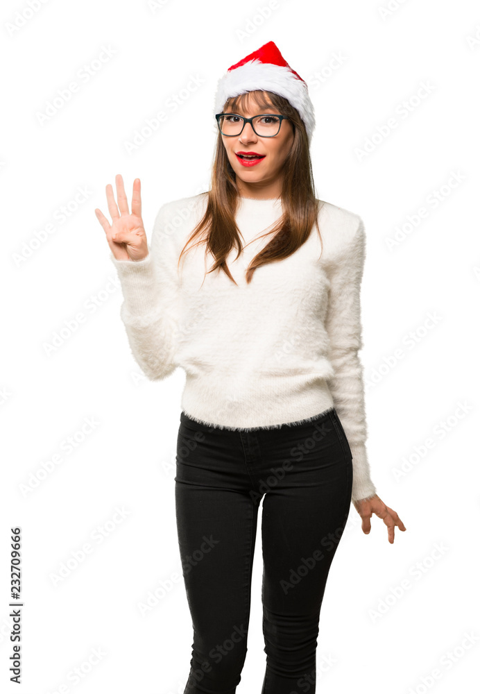 Girl with celebrating the christmas holidays happy and counting four with fingers on isolated white background Girl with celebrating the christmas holidays happy and counting four with fingers on isolated white background