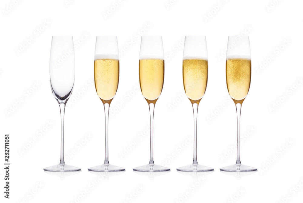 Elegant glasses of yellow champagne with bubbles