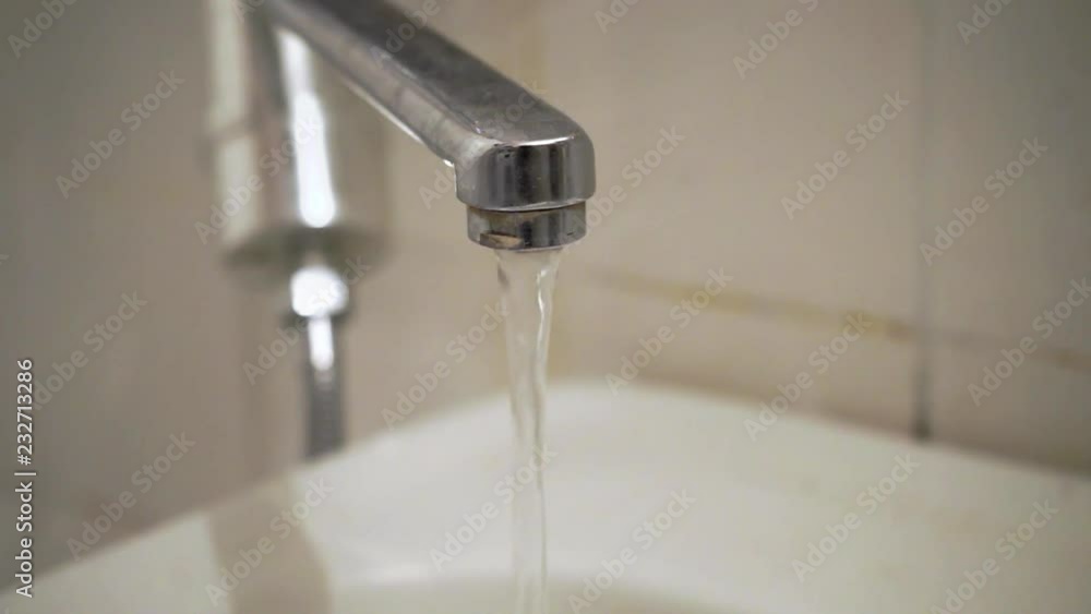 faucet with flowing water in wash sink. 10 faucet with flowing water in wash sink. 10
