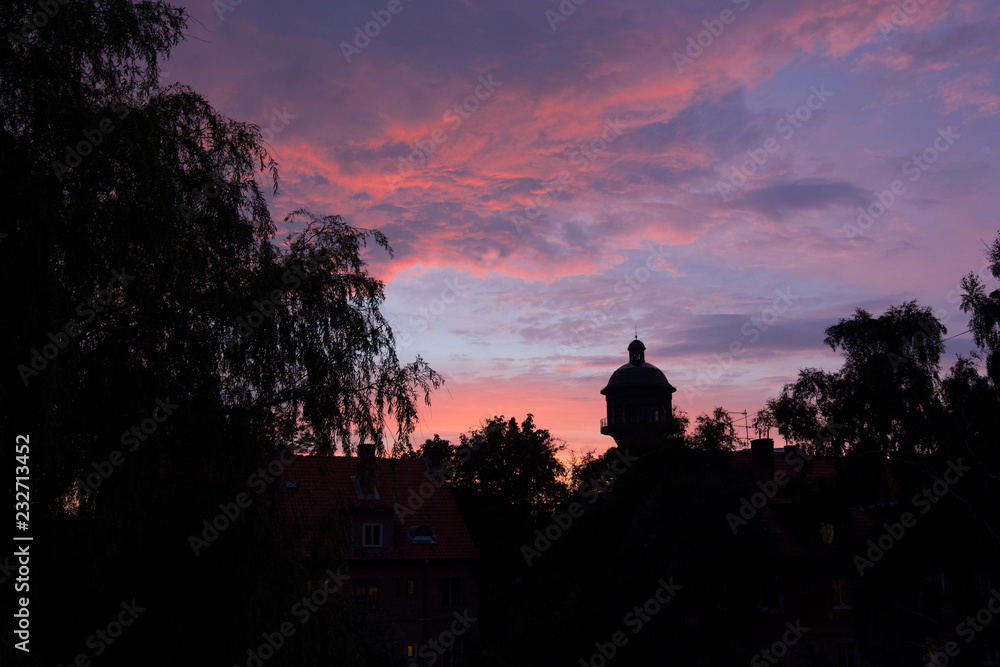 Sunset in August with beautiful clouds the view of the old town of Zelenogradsk on the Baltic sea