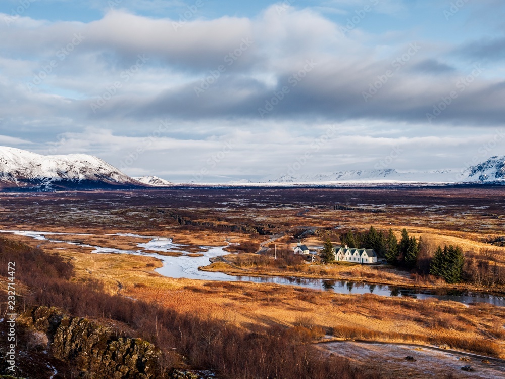 Sunlight shining on the church in the rift valley at Thingvellir in central Iceland Sunlight shining on the church in the rift valley at Thingvellir in central Iceland