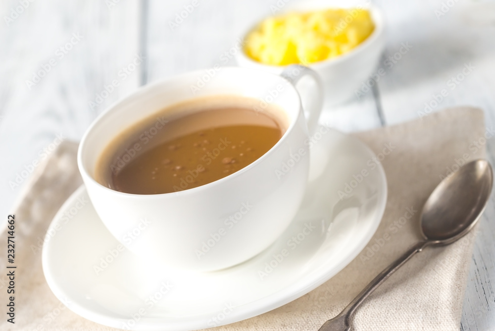Cup of coffee with ghee butter Cup of coffee with ghee butter