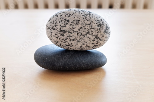 stones on a wooden background