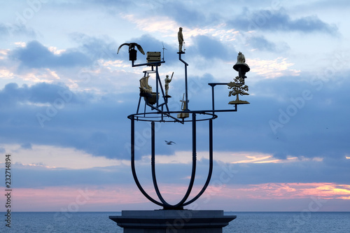 plinth on Hove seafront promenade with constellation sculpture on it photo