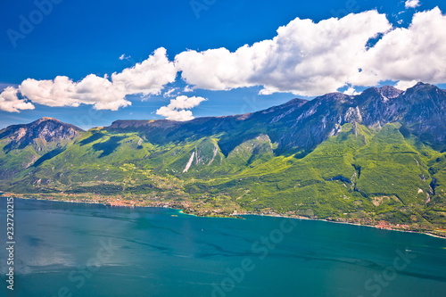Lago di Garda and high mountain cliffs above Malcesine view
