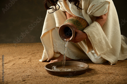 Jesus pouring water from a jar