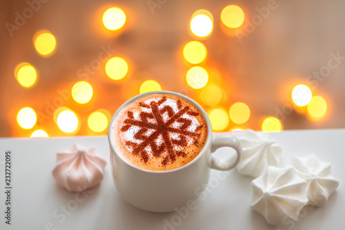 Cappuccino with a pattern of snowflakes as