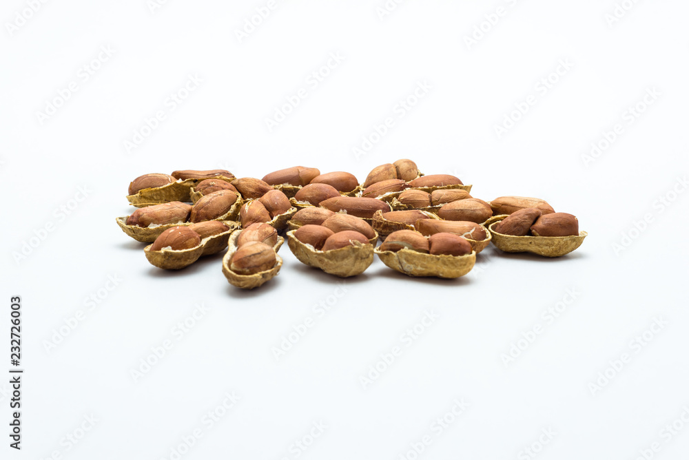 Peanuts in shell isolated on a white background. Peanuts in shell isolated on a white background.