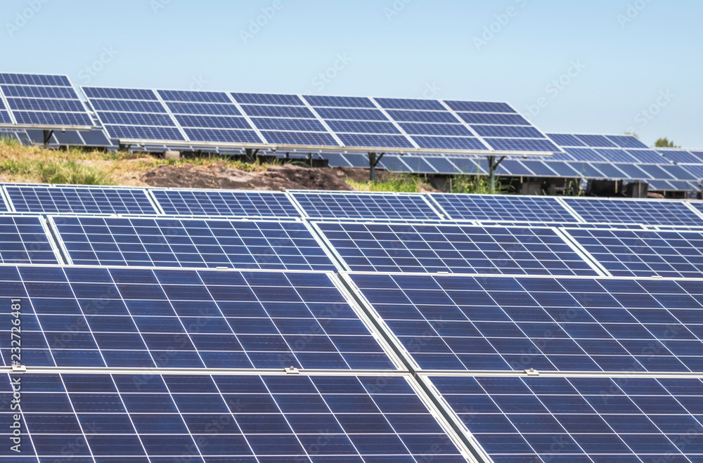 Close up rows array of solar cells or photovoltaics in solar power station convert light energy from the sun into electricity alternative renewable clean energy from the sun Close up rows array of solar cells or photovoltaics in solar power station convert light energy from the sun into electricity alternative renewable clean energy from the sun