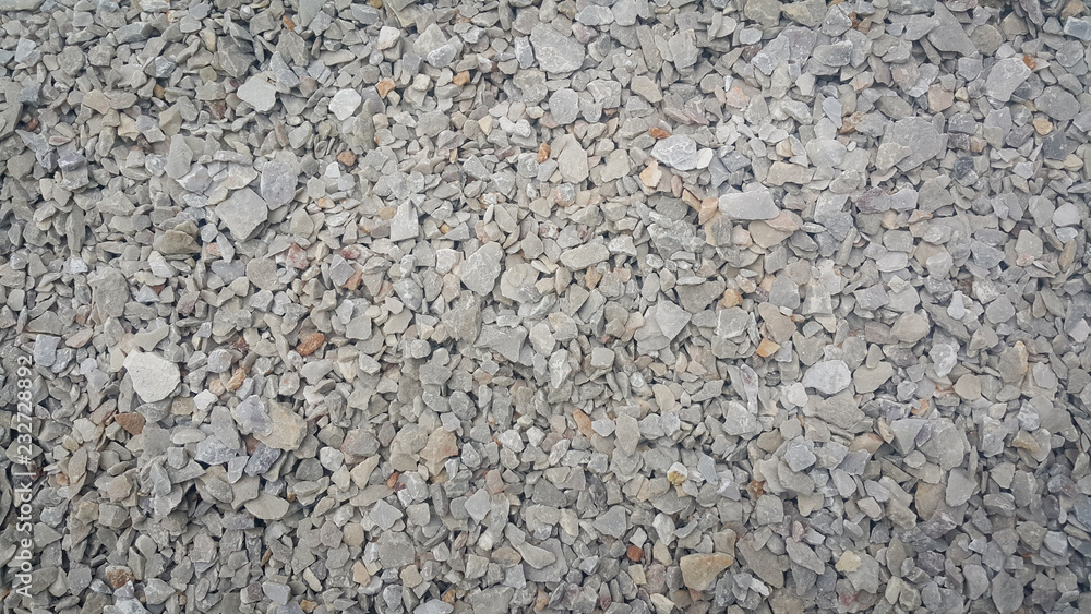 Small piles of limestone for use in lime kiln line . Limestone gravel background Texture. Small piles of limestone for use in lime kiln line . Limestone gravel background Texture.