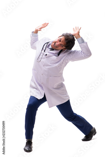 Young handsome doctor under pressure isolated on white