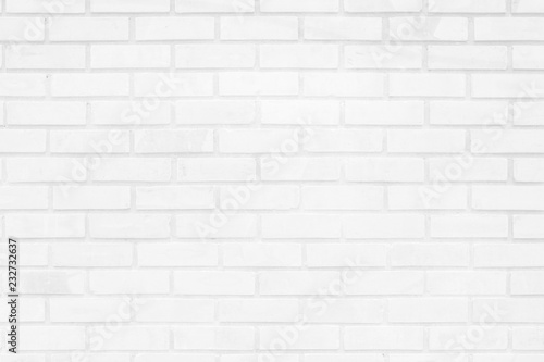 White and Gray brick wall texture background. Brickwork or stonework flooring interior rock old pattern clean concrete grid uneven bricks design stack.