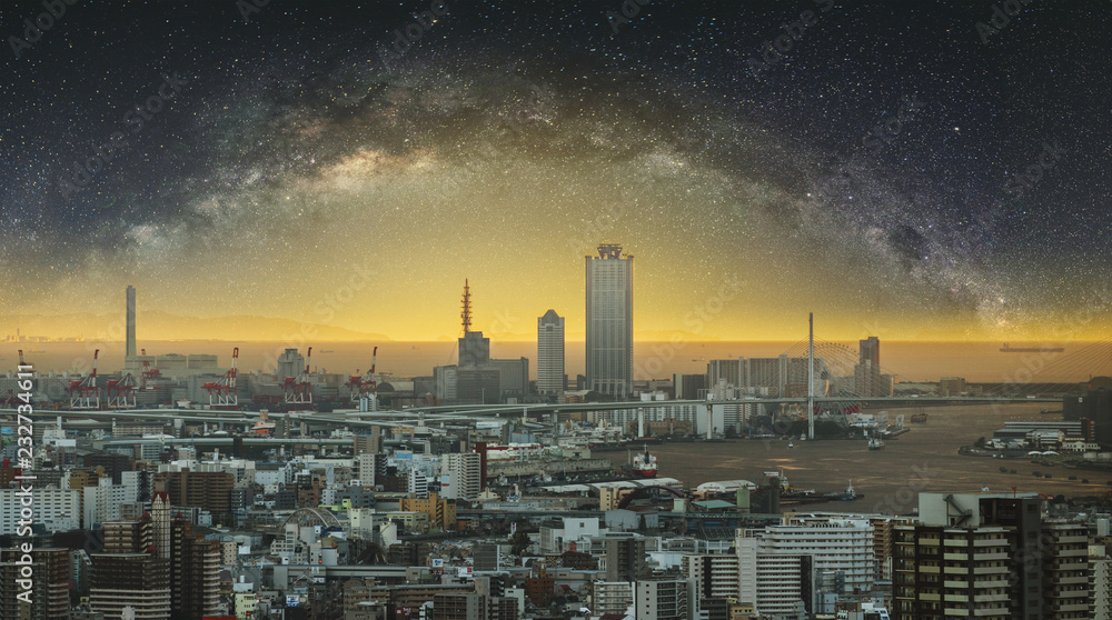 Obraz premium Panoramic Osaka city at dawn with starry sky
