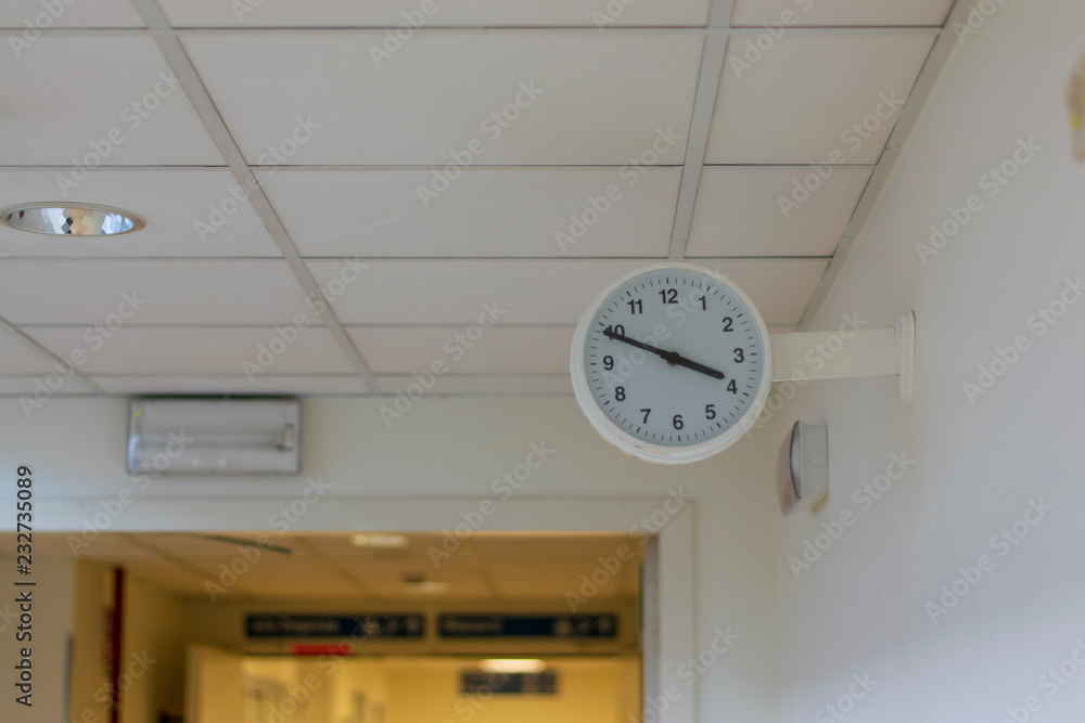 clock in a hospital corridor clock in a hospital corridor