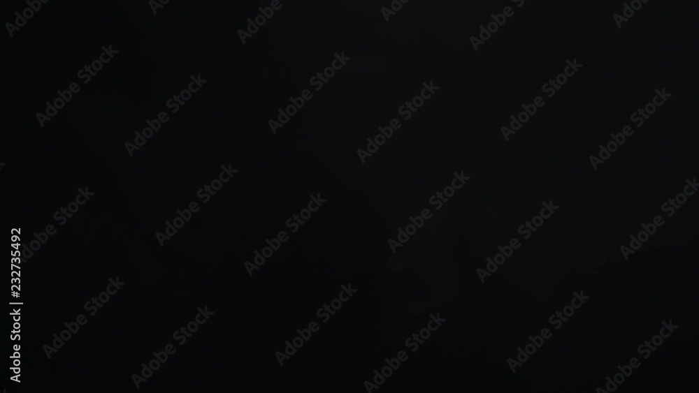 Smoke billowing on black background Smoke billowing on black background