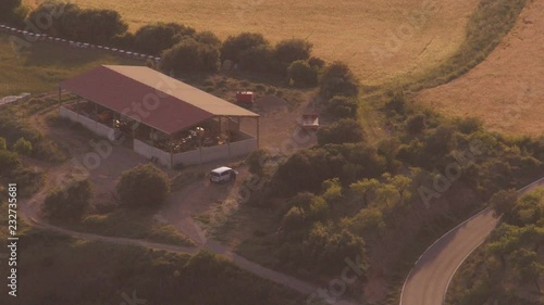 Car parking at stable in landscape in Pyrenees mountains in Spain photo