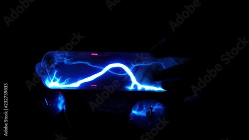 Science project: A fluorescent lamp ignites in electromagnetic field  photo