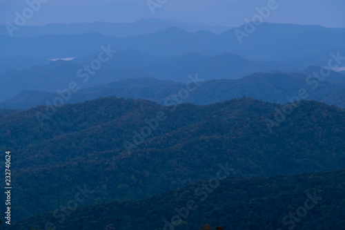 blue color of mountains layers during sunrise, Mea Kumpong, Thailand