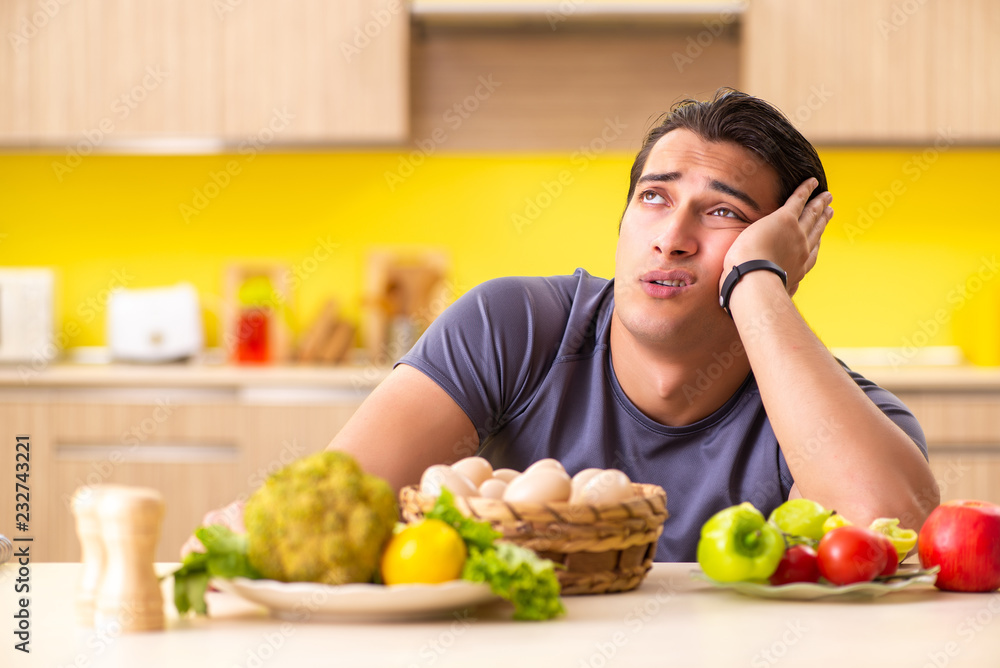 Young man in dieting and healthy eating concept Young man in dieting and healthy eating concept