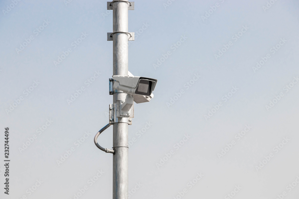 Cctv security surveillance camera system attached on the traffic light. Cctv security surveillance camera system attached on the traffic light.
