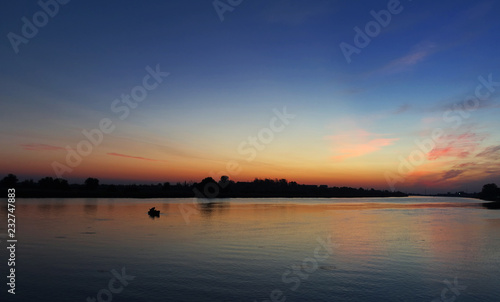 sunset on river © Nikolay