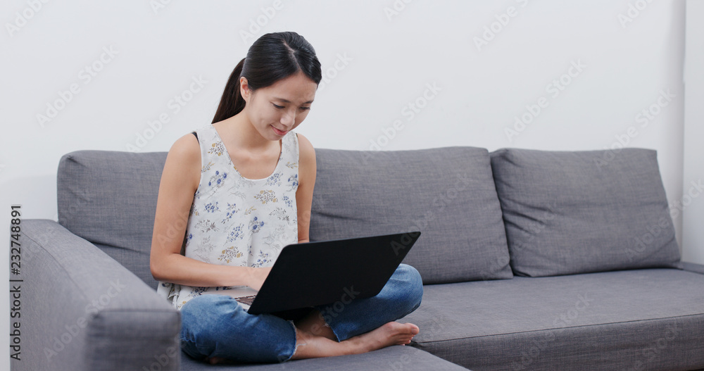 Woman work on laptop computer at home Woman work on laptop computer at home