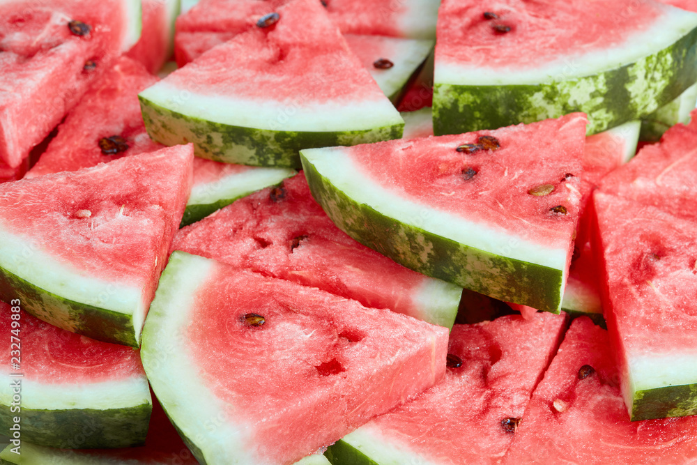 slices of ripe watermelon as textured background slices of ripe watermelon as textured background
