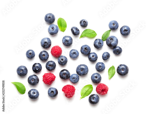top view of heap of assorted berries isolated on white background