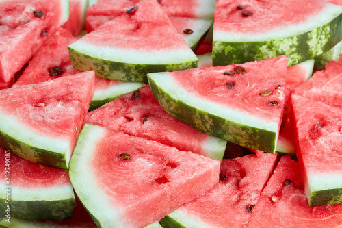 slices of ripe watermelon as textured background