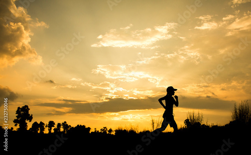 Fitness silhouette sunrise jogging workout wellness concept © taira42