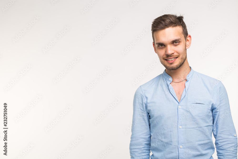 Self-confidence, business and people concept - Successful handsome man with smile on white background with copy space Self-confidence, business and people concept - Successful handsome man with smile on white background with copy space
