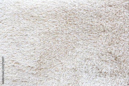 Fluffy carpet with texture. © aekkorn