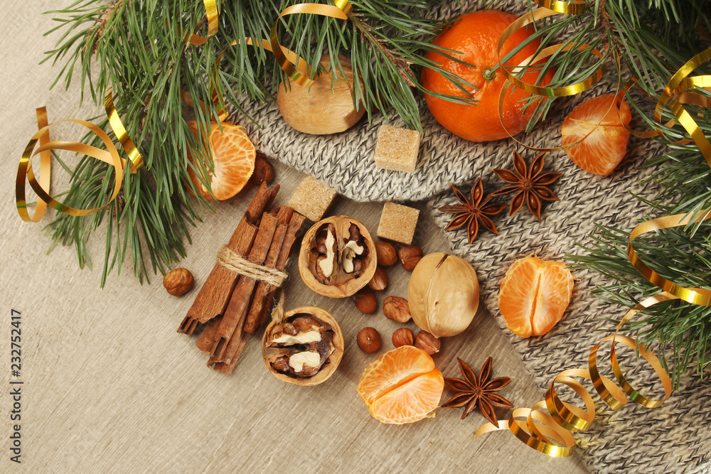 Still life formed with pine branches and New Year sweets Still life formed with pine branches and New Year sweets