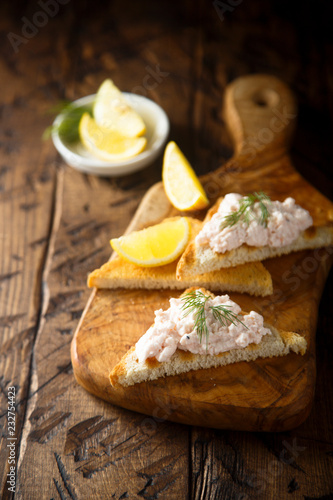 Creamy shrimp appetizer on toast photo