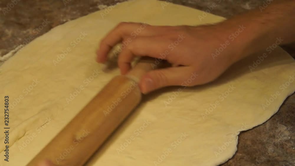 Chef kneads the dough. Chef preparing pizza. Making pizza. Cooking process Chef kneads the dough. Chef preparing pizza. Making pizza. Cooking process